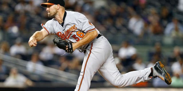 NEW YORK, NY - SEPTEMBER 09: Darren O'Day #56 of the Baltimore Orioles in action against the New York Yankees at Yankee Stadium on September 9, 2015 in the Bronx borough of New York City. (Photo by Rich Schultz/Getty Images)