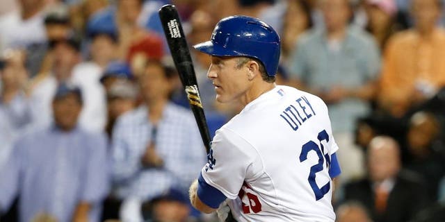 LOS ANGELES, CA - OCTOBER 15: Chase Utley #26 of the Los Angeles Dodgers flies out in the ninth inning while taking on the New York Mets in game five of the National League Division Series at Dodger Stadium on October 15, 2015 in Los Angeles, California. (Photo by Sean M. Haffey/Getty Images)