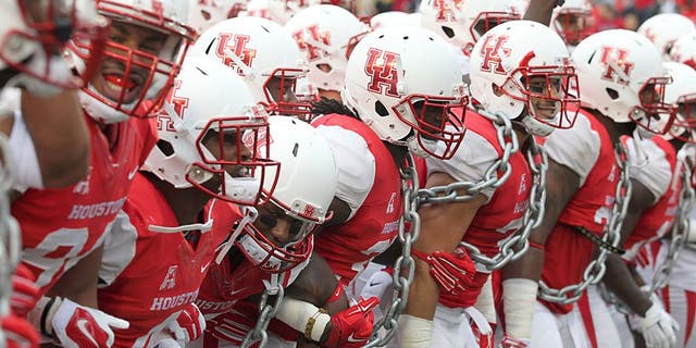 Nov 7, 2015; Houston, TX, USA; The Houston Cougars players fire up the crowd prior to their game against the Cincinnati Bearcats at TDECU Stadium. The Cougars won 33-30. Mandatory Credit: Thomas B. Shea-USA TODAY Sports