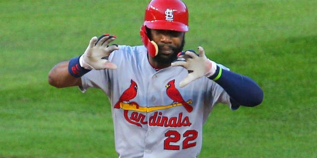 Oct 12, 2015; Chicago, IL, USA; St. Louis Cardinals right fielder Jason Heyward (22) celebrates after hitting a double during the second inning in game three of the NLDS against the Chicago Cubs at Wrigley Field. Mandatory Credit: Dennis Wierzbicki-USA TODAY Sports
