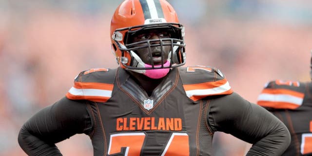 CLEVELAND, OH - OCTOBER 18, 2015: Offensive lineman Cameron Erving #74 of the Cleveland Browns walks onto the field prior to a game against the Denver Broncos on October 18, 2015 at FirstEnergy Stadium in Cleveland, Ohio. Denver won 26-23 in overtime. (Photo by Nick Cammett/Diamond Images/Getty Images)