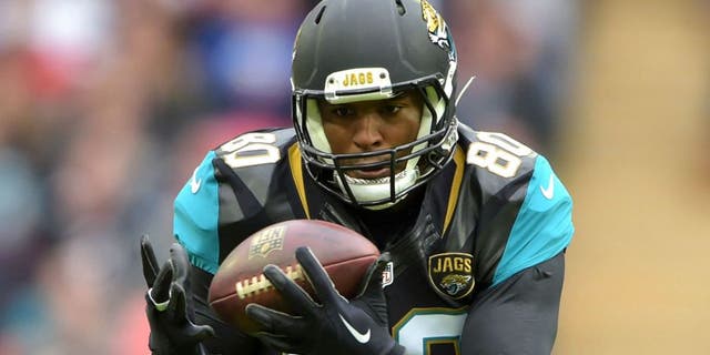 Oct 25, 2015; London, United Kingdom; Jacksonville Jaguars tight end Julius Thomas (80) catches a pass against the Buffalo Bills during NFL International Series game at Wembley Stadium. Mandatory Credit: Kirby Lee-USA TODAY Sports
