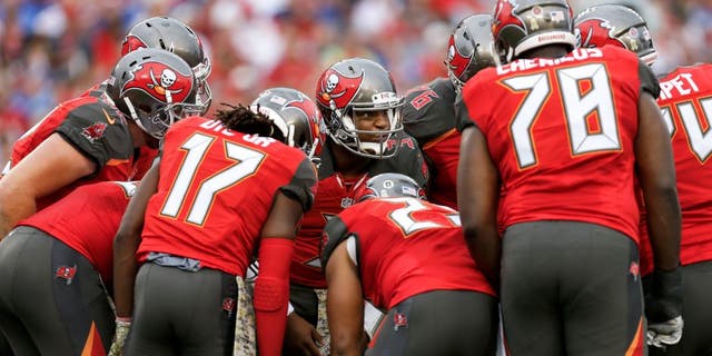 TAMPA, FL - NOVEMBER 8: Quarterback Jameis Winston #3 of the Tampa Bay Buccaneers calls a play in the huddle during the game against the New York Giants at Raymond James Stadium on November 8, 2015 in Tampa, Florida. The Giants defeated the Buccaneers 32 to 18. (Photo by Don Juan Moore/Getty Images)