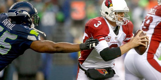 SEATTLE, WA - DECEMBER 22: Quarterback Carson Palmer #3 of the Arizona Cardinals rushes against the Seattle Seahawks at CenturyLink Field on December 22, 2013 in Seattle, Washington. (Photo by Otto Greule Jr/Getty Images)