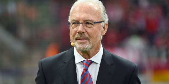 German football legend Franz Beckenbauer attends the DFB German Cup final football match BVB Borussia Dortmund vs Bayern Munich at the Olympic Stadium in Berlin on May 17, 2014. AFP PHOTO / PATRIK STOLLARZ RESTRICTIONS / EMBARGO ACCORDING TO DFB RULES IMAGE SEQUENCES TO SIMULATE VIDEO IS NOT ALLOWED DURING MATCH TIME. MOBILE (MMS) USE IS NOT ALLOWED DURING AND FOR FURTHER TWO HOURS AFTER THE MATCH. FOR MORE INFORMATION CONTACT DFB DIRECTLY AT +49 69 67880 (Photo credit should read PATRIK STOLLARZ/AFP/Getty Images)