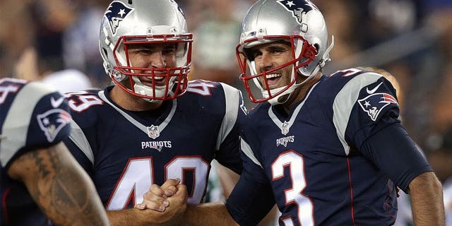 FOXBOROUGH, MA - AUGUST 13: (2nd quarter) New England Patriots kicker Stephen Gostkowski (3) and New England Patriots long snapper Joe Cardona (49) celebrate after Gostkowski kicked a 56 yard field goal at the end of the second quarter. The New England Patriots played the Green Bay Packers in an exhibition game at Gillette Stadium in Foxborough, Mass. on Aug. 13, 2015. (Photo by Barry Chin/The Boston Globe via Getty Images)