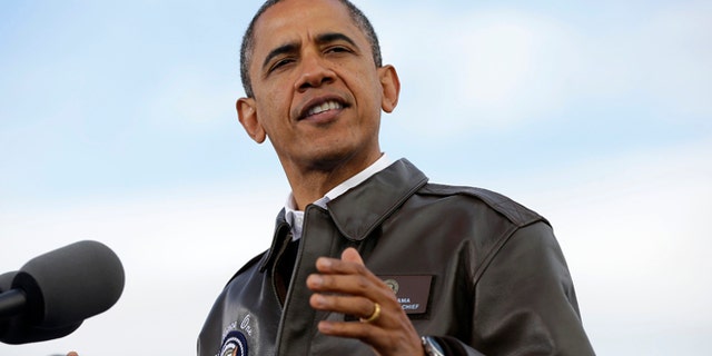 FILE: Nov. 1, 2012: President Barack Obama speaks at Austin Straubel International Airport in Green Bay, Wis.