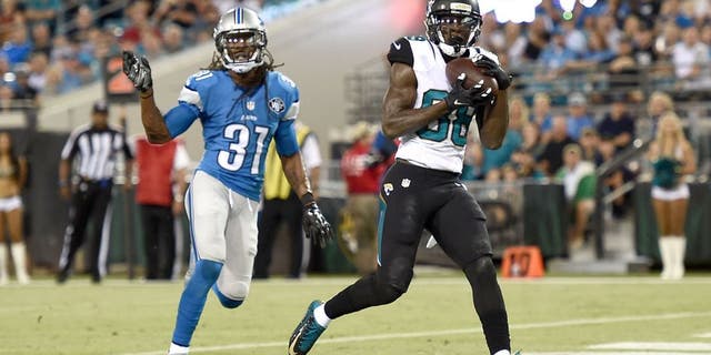 JACKSONVILLE, FL - AUGUST 28: Allen Hurns #88 of the Jacksonville Jaguars catches a pass for a touchdown in front of Rashean Mathis #31 of the Detroit Lions during the first quarter of a preseason game at EverBank Field on August 28, 2015 in Jacksonville, Florida. (Photo by Stacy Revere/Getty Images)