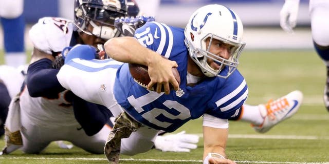 INDIANAPOLIS, IN - NOVEMBER 08: Andrew Luck #12 of the Indianapolis Colts runs with the ball during the game against the Denver Broncos at Lucas Oil Stadium on November 8, 2015 in Indianapolis, Indiana. (Photo by Andy Lyons/Getty Images)