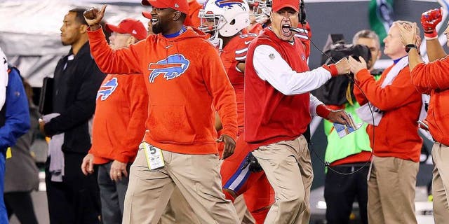 EAST RUTHERFORD, NJ - NOVEMBER 12: Head coach Rex Ryan of the Buffalo Bills celebrates a second quarter touchdown by Duke Williams #27 (not pictured) against the New York Jets at MetLife Stadium on November 12, 2015 in East Rutherford, New Jersey. (Photo by Elsa/Getty Images)