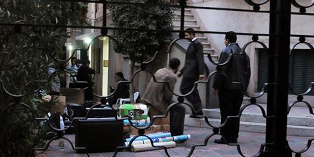 December 29, 2011: Egyptian police raid a non-governmental organization office in Cairo, Egypt.
