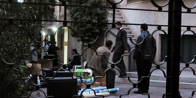 December 29, 2011: Egyptian police raid a non-governmental organization office in Cairo, Egypt.