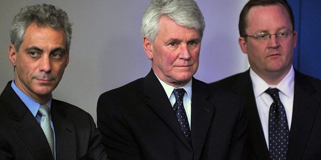 File: White House Chief of Staff Rahm Emanuel, left, stands with former White House Counsel Greg Craig and Press Secretary Robert Gibbs at a White House briefing. (AFP)