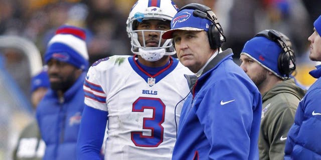 Nov 10, 2013; Pittsburgh, PA, USA; Buffalo Bills quarterback EJ Manuel (3) and Buffalo Bills head coach Doug Marrone (right) watch a scoreboard replay against the Pittsburgh Steelers during the fourth quarter at Heinz Field. The Pittsburgh Steelers won 23-10. Mandatory Credit: Charles LeClaire-USA TODAY Sports