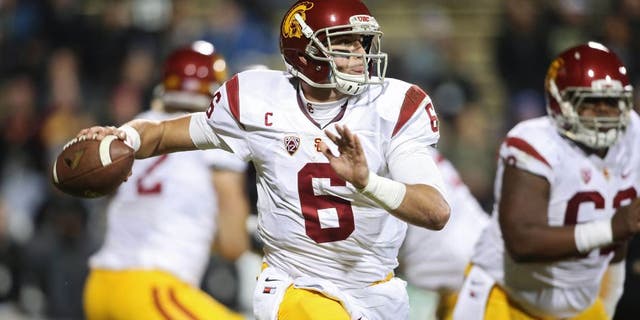 Nov 13, 2015; Boulder, CO, USA; USC Trojans quarterback Cody Kessler (6) looks to pass the ball during the first half against the Colorado Buffaloes at Folsom Field. Mandatory Credit: Chris Humphreys-USA TODAY Sports