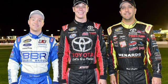 FORT WORTH, TX - NOVEMBER 06: (L-R) NASCAR Camping World Truck Series championship contenders Tyler Reddick, driver of the #19 Stoney Creek Records Ford, Erik Jones, driver of the #4 Toyota, and Matt Crafton, driver of the #88 Damp Rid/Menards Toyota, pose for a photograph prior to the NASCAR Camping World Truck Series WinStar World Casino 350 at Texas Motor Speedway on November 6, 2015 in Fort Worth, Texas. (Photo by Jared C. Tilton/NASCAR via Getty Images)
