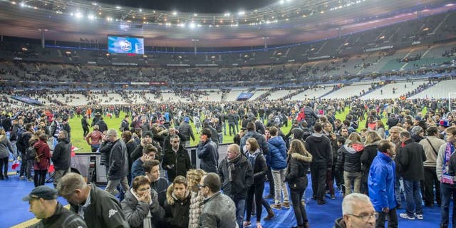 supporters run in panic on the pitch during the International friendly match between France and Germany on November 13, 2015 at the Stade France in Paris, France.(Photo by VI Images via Getty Images)