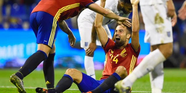 ALICANTE, SPAIN - NOVEMBER 13: Mario Gaspar of Spain (24) celebrates with Paco Alcacer Garcia (9) as he scores their first goal during the international friendly match between Spain and England at Jose Rico Perez Stadium on November 13, 2015 in Alicante, Spain. (Photo by Mike Hewitt/Getty Images)