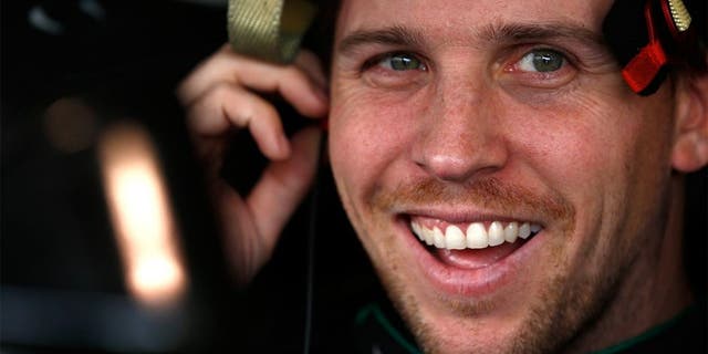 MARTINSVILLE, VA - OCTOBER 31: Denny Hamlin, driver of the #11 FedEx Ground Toyota, sits in his car during practice for the NASCAR Sprint Cup Series Goody's Headache Relief Shot 500 at Martinsville Speedway on October 31, 2015 in Martinsville, Virginia. (Photo by Jeff Zelevansky/Getty Images)
