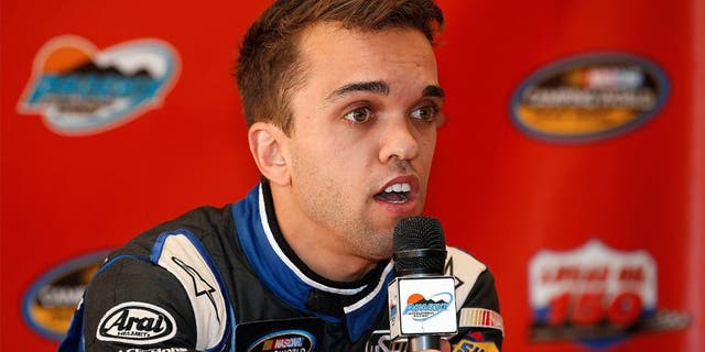 AVONDALE, AZ - NOVEMBER 13: Rico Abreu, driver of the #31 AccuDoc Solutions Chevrolet, speaks to the media before practice for the NASCAR Camping World Truck Series Lucas Oil 150 at Phoenix International Raceway on November 13, 2015 in Avondale, Arizona. (Photo by Todd Warshaw/Getty Images)