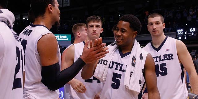 INDIANAPOLIS, IN - NOVEMBER 14: Jordan Gathers #5 of the Butler Bulldogs and members of the Butler Bulldogs celebrate an NCAA record for points scored after defeating Citadel 144-71 at Hinkle Fieldhouse on November 14, 2015 in Indianapolis, Indiana. (Photo by Michael Hickey/Getty Images)