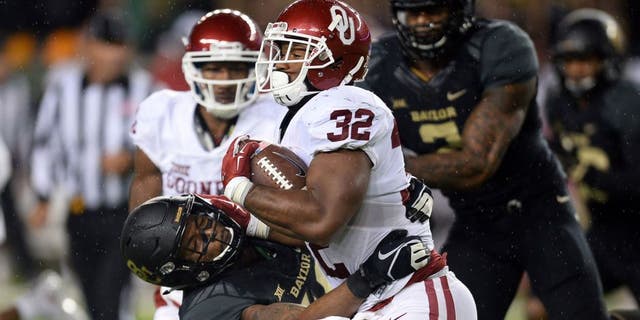 Nov 14, 2015; Waco, TX, USA; Oklahoma Sooners running back Samaje Perine (32) runs with the ball against the Baylor Bears at McLane Stadium. Oklahoma won 44-34. Mandatory Credit: Joe Camporeale-USA TODAY Sports