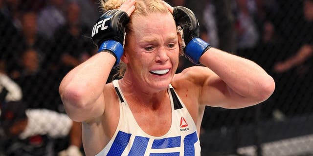 MELBOURNE, AUSTRALIA - NOVEMBER 15: Holly Holm celebrates her second round KO (headkick and punches) over Ronda Rousey (not pictured) in their UFC women's bantamweight championship bout during the UFC 193 event at Etihad Stadium on November 15, 2015 in Melbourne, Australia. (Photo by Josh Hedges/Zuffa LLC/Zuffa LLC via Getty Images)