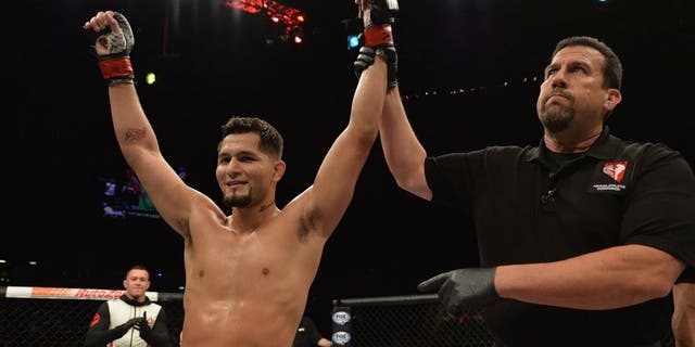 LAS VEGAS, NV - JULY 12: Jorge Masvidal reacts to his victory over Cezar Ferreira in their welterweight bout during the Ultimate Fighter Finale inside MGM Grand Garden Arena on July 12, 2015 in Las Vegas, Nevada. (Photo by Brandon Magnus/Zuffa LLC/Zuffa LLC via Getty Images)