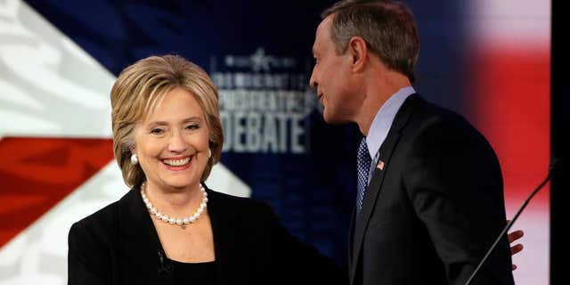 Nov. 14, 2015: Hillary Rodham Clinton shakes hands with Martin O'Malley after a Democratic presidential primary debate in Des Moines, Iowa.