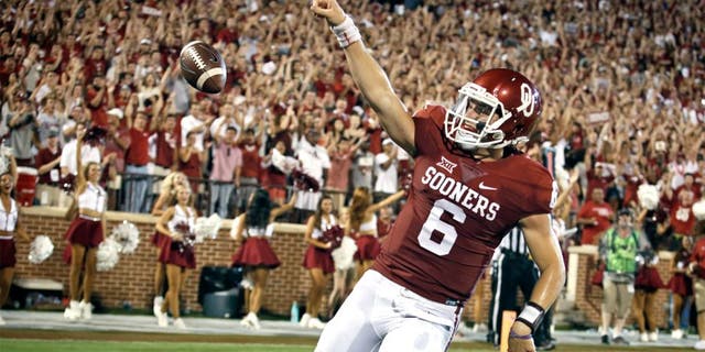 NORMAN, OK - SEPTEMBER 5: Quarterback Baker Mayfield #6 of the Oklahoma Sooners celebrates a touchdown against the Akron Zips September 5, 2015 at Gaylord Family-Oklahoma Memorial Stadium in Norman, Oklahoma. Oklahoma defeated Akron 41-3.(Photo by Brett Deering/Getty Images)