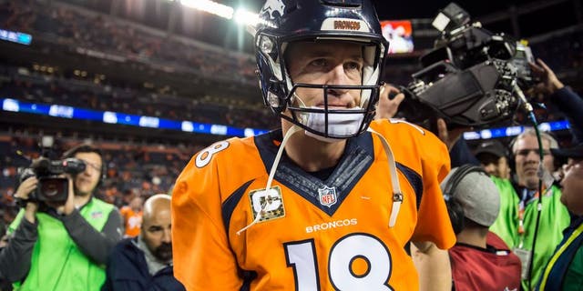 Denver Broncos quarterback Peyton Manning (18) walks off the field after throwing four interceptions and being replaced by Denver Broncos quarterback Brock Osweiler in the 29-13 loss to the Kansas City Chiefs on Sunday, Nov. 15, 2015, at Sports Authority Field at Mile High Stadium in Denver. (David Eulitt/Kansas City Star/TNS via Getty Images)