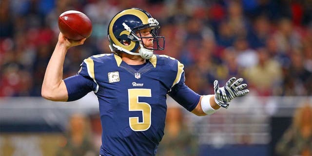 Nov 15, 2015; St. Louis, MO, USA; St. Louis Rams quarterback Nick Foles (5) drops back for a pass during the first half against the Chicago Bears at the Edward Jones Dome. Mandatory Credit: Billy Hurst-USA TODAY Sports