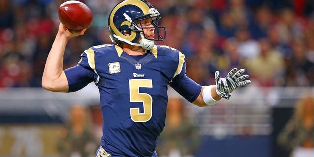 Nov 15, 2015; St. Louis, MO, USA; St. Louis Rams quarterback Nick Foles (5) drops back for a pass during the first half against the Chicago Bears at the Edward Jones Dome. Mandatory Credit: Billy Hurst-USA TODAY Sports
