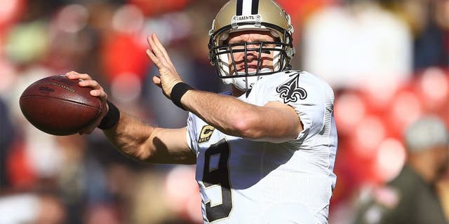 LANDOVER, MD - NOVEMBER 15: Quarterback Drew Brees #9 of the New Orleans Saints warms up prior to a game against the Washington Redskins at FedExField on November 15, 2015 in Landover, Maryland. (Photo by Matt Hazlett/Getty Images)