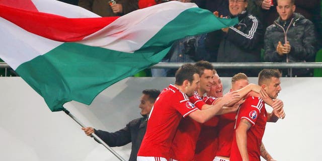 Football Soccer - Hungary vs Norway- UEFA EURO 2016 play-off - Grupama Arena 15/11/15. Hungary's Tamas Priskin (R) celebrates with teammates after scoring a goal. REUTERS/Laszlo Balogh Picture Supplied by Action Images