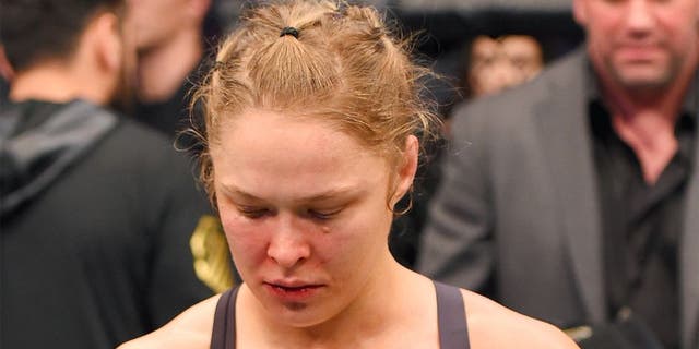 MELBOURNE, AUSTRALIA - NOVEMBER 15: Ronda Rousey looks on after losing her championship title by KO (head kick and punches) to Holly Holm (not pictured) in two rounds of their UFC women's bantamweight championship bout during the UFC 193 event at Etihad Stadium on November 15, 2015 in Melbourne, Australia. (Photo by Josh Hedges/Zuffa LLC/Zuffa LLC via Getty Images)
