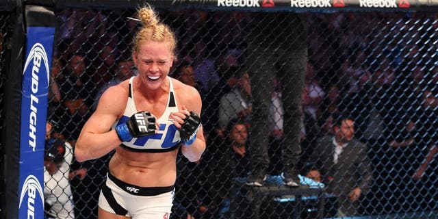 MELBOURNE, AUSTRALIA - NOVEMBER 15: Holly Holm celebrates her second round KO (head kick and punches) over Ronda Rousey (not pictured) in their UFC women's bantamweight championship bout during the UFC 193 event at Etihad Stadium on November 15, 2015 in Melbourne, Australia. (Photo by Josh Hedges/Zuffa LLC/Zuffa LLC via Getty Images)