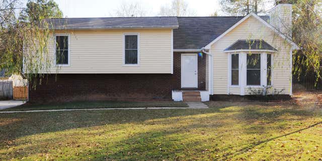 The suburban home where police say a 14-year-old boy was held for most of two years in the basement is shown on Tuesday, Nov. 15, 2016, in Helena, Ala.