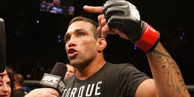 MEXICO CITY, MEXICO - NOVEMBER 15: Fabricio Werdum of Brazil celebrates after knocking out Mark Hunt in their interim UFC heavyweight championship bout during the UFC 180 event at Arena Ciudad de Mexico on November 15, 2014 in Mexico City, Mexico. (Photo by Josh Hedges/Zuffa LLC/Zuffa LLC via Getty Images)