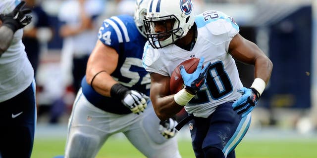 Sep 27, 2015; Nashville, TN, USA; Tennessee Titans running back Bishop Sankey (20) runs for a short gain during the second half against the Indianapolis Colts at Nissan Stadium. The Colts won 35-33. Mandatory Credit: Christopher Hanewinckel-USA TODAY Sports