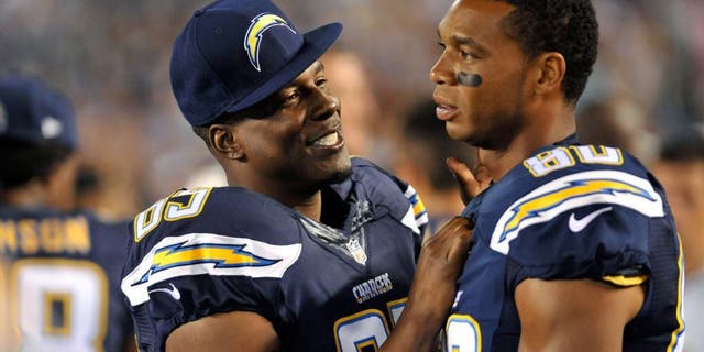 Aug 13, 2015; San Diego, CA, USA; San Diego Chargers tight end Antonio Gates (85) and wide receiver Malcom Floyd (80) in a preseason NFL football game against the Dallas Cowboys at Qualcomm Stadium. Mandatory Credit: Orlando Ramirez-USA TODAY Sports