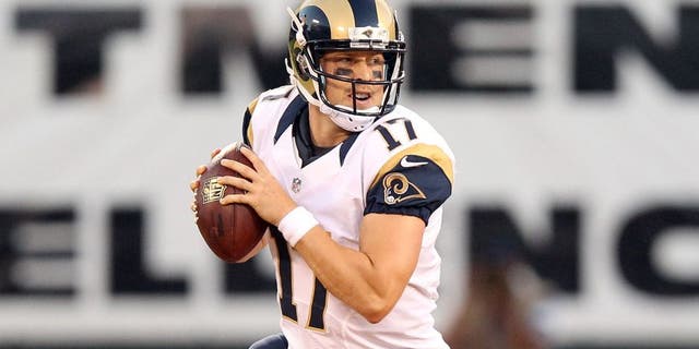 OAKLAND, CA - AUGUST 14: Case Keenum #17 of the St. Louis Rams looks to pass the ball against the Oakland Raiders at O.co Coliseum on August 14, 2015 in Oakland, California. (Photo by Ezra Shaw/Getty Images)