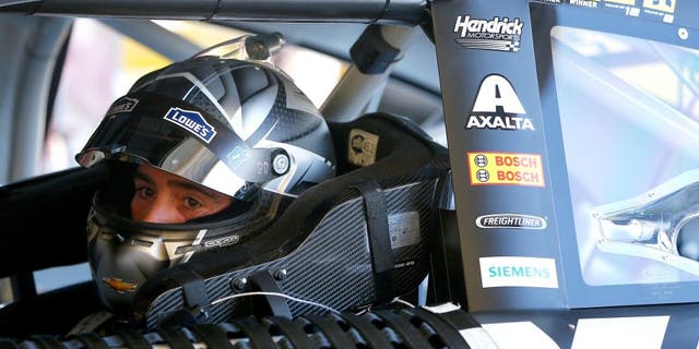 AVONDALE, AZ - NOVEMBER 11: Jimmie Johnson, driver of the #48 Kobalt Chevrolet, sits in his car during practice for the NASCAR Sprint Cup Series Can-Am 500 at Phoenix International Raceway on November 11, 2016 in Avondale, Arizona. (Photo by Jonathan Ferrey/Getty Images)