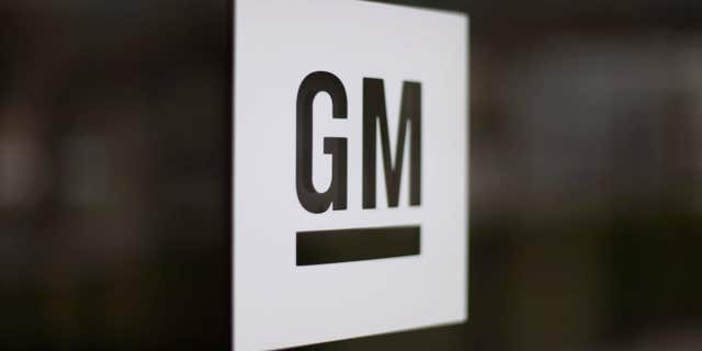 FILE - This Friday, May 16, 2014, file photo, shows the General Motors logo at the company's world headquarters in Detroit.