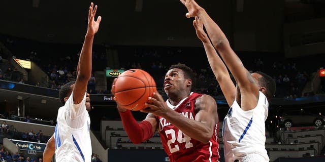 MEMPHIS, TN - NOVEMBER 17: Buddy Hield #24 of the Oklahoma Sooners drives to the basket against the Memphis Tigers on November 17, 2015 at FedExForum in Memphis, Tennessee. NOTE TO USER: User expressly acknowledges and agrees that, by downloading and or using this photograph, User is consenting to the terms and conditions of the Getty Images License Agreement. (Photo by Joe Murphy/Getty Images)