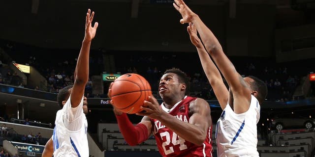 MEMPHIS, TN - NOVEMBER 17: Buddy Hield #24 of the Oklahoma Sooners drives to the basket against the Memphis Tigers on November 17, 2015 at FedExForum in Memphis, Tennessee. NOTE TO USER: User expressly acknowledges and agrees that, by downloading and or using this photograph, User is consenting to the terms and conditions of the Getty Images License Agreement. (Photo by Joe Murphy/Getty Images)
