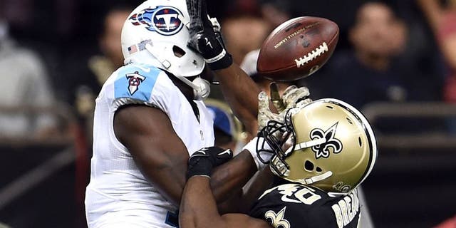NEW ORLEANS, LA - NOVEMBER 08: Delvin Breaux #40 of the New Orleans Saints defends a pass intended for Dorial Green-Beckham #17 of the Tennessee Titans during a game at the Mercedes-Benz Superdome on November 8, 2015 in New Orleans, Louisiana. The Titans won the game in overtime 34-28. (Photo by Stacy Revere/Getty Images)