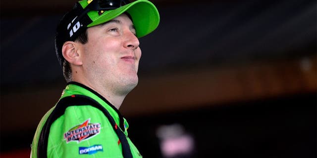 MARTINSVILLE, VA - OCTOBER 30: Kyle Busch, driver of the #18 M&M's Crispy Toyota, stands in the garage area during practice for the NASCAR Sprint Cup Series Goody's Headache Relief Shot 500 at Martinsville Speedway on October 30, 2015 in Martinsville, Virginia. (Photo by Robert Laberge/Getty Images)