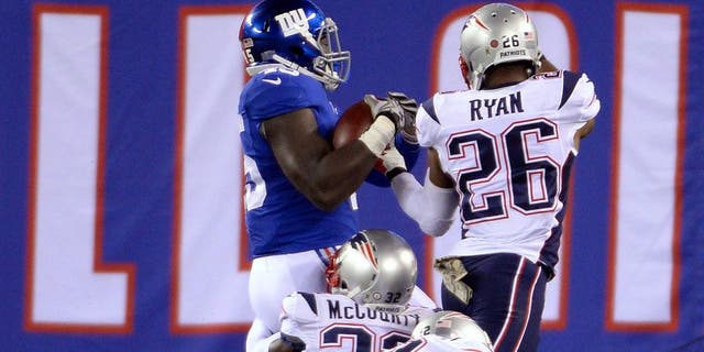 Nov 15, 2015; East Rutherford, NJ, USA; New York Giants tight end Will Tye (45) catches a pass and is tackled at the one yard line by the New England Patriots in the second quarter during the game at MetLife Stadium. Mandatory Credit: Robert Deutsch-USA TODAY Sports