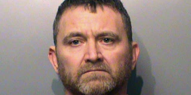 FILE - This Nov. 3, 2016 file photo provided by the Polk County Sheriff's Office in Des Moines, Iowa, shows Scott Michael Greene, who is charged with first-degree murder in the deaths of Des Moines Sgt. Anthony Beminio and Urbandale officer Justin Martin.